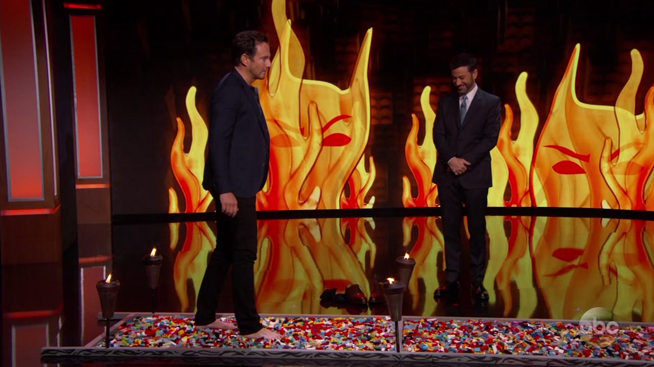 Will Arnett painfully walks on Legos